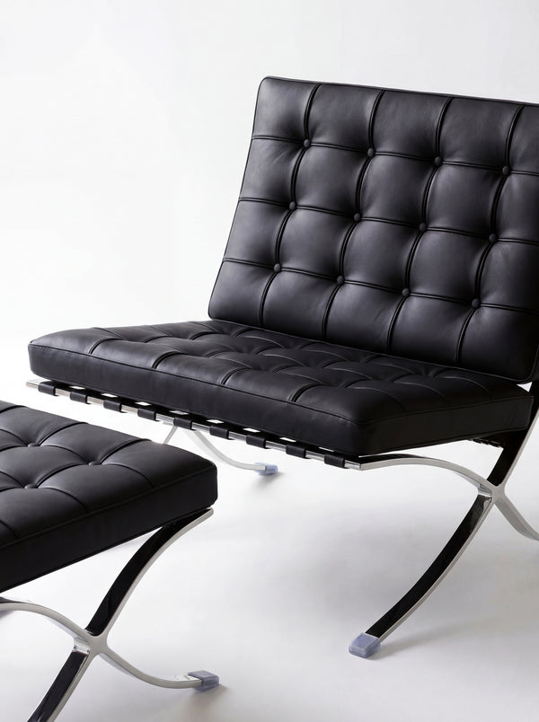 Lounge Chair &amp; Footstool – Black Genuine Leather &amp; Sculptural Chrome Frame